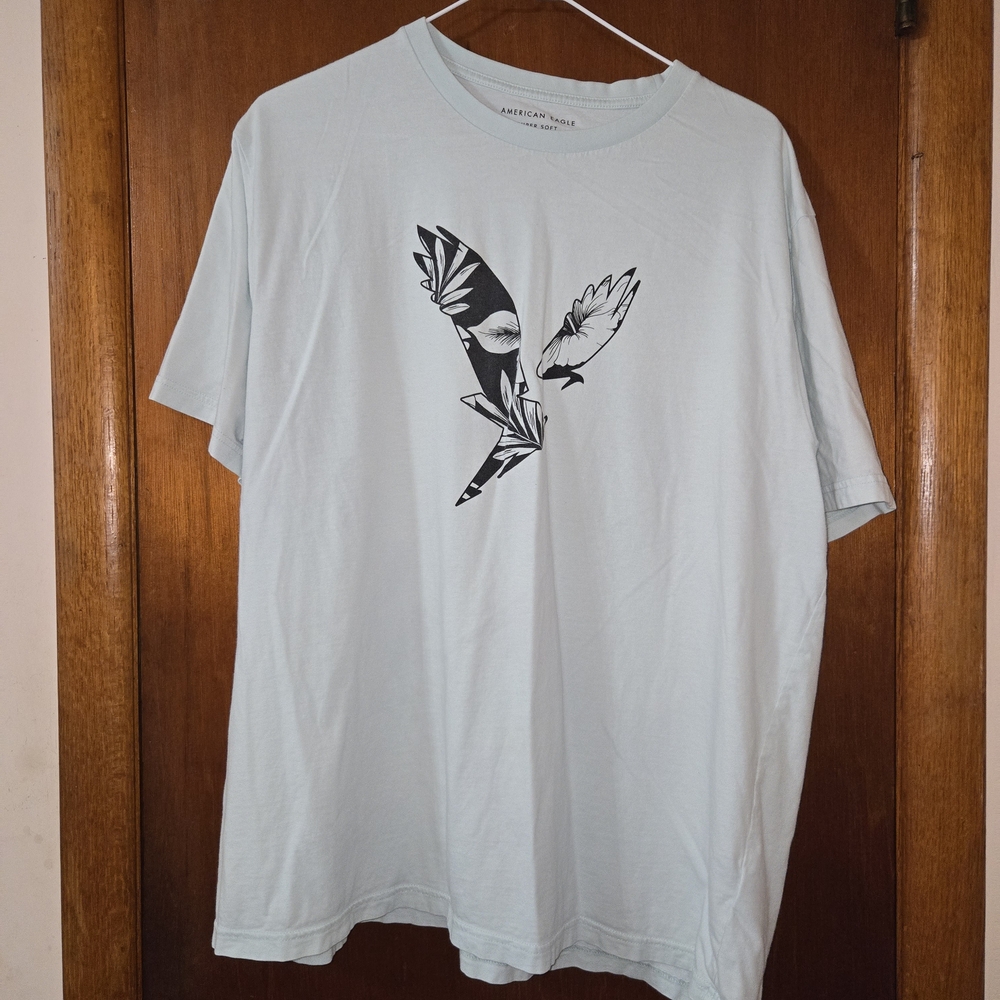 American Eagle Outfitters Pale Blue Tee with Black Bird Graphic